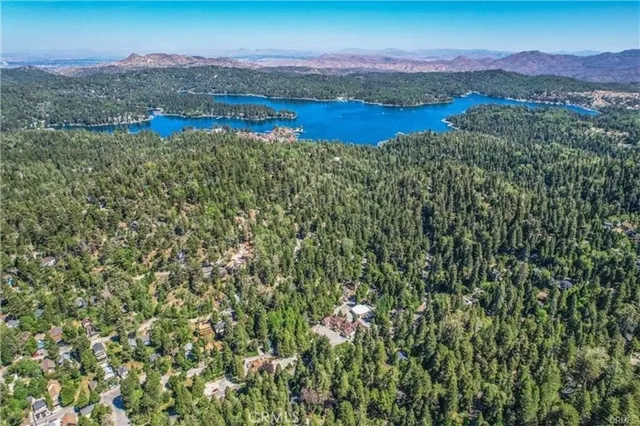 a view of a lake with mountains in the background