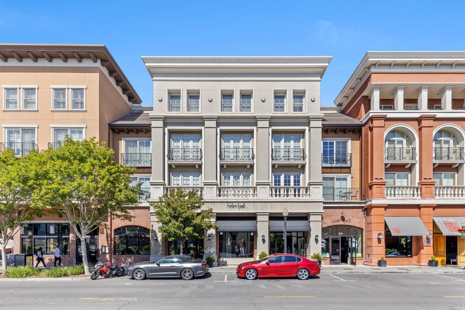 588 Main Street, Unit 210 Napa, CA 94559 - Photo 1 of 27 a front view of multi story residential apartment building