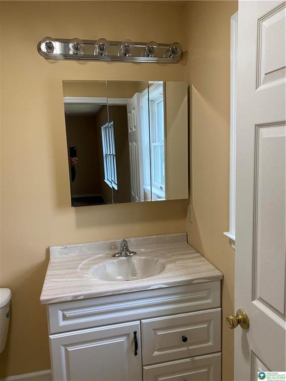 2862 Christian Springs Road Nazareth, PA 18064 - Photo 6 of 16 A well-appointed bathroom vanity with a spacious countertop and bright mirror.