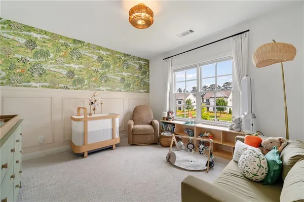 a room with furniture and a large window