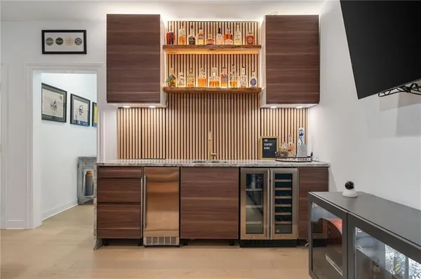 a kitchen with a stove and cabinets