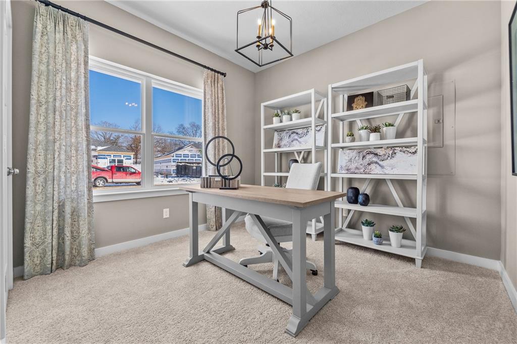 121 Jerome Drive Butler, PA 16001 - Photo 16 of 20 a room with furniture a chandelier and a window