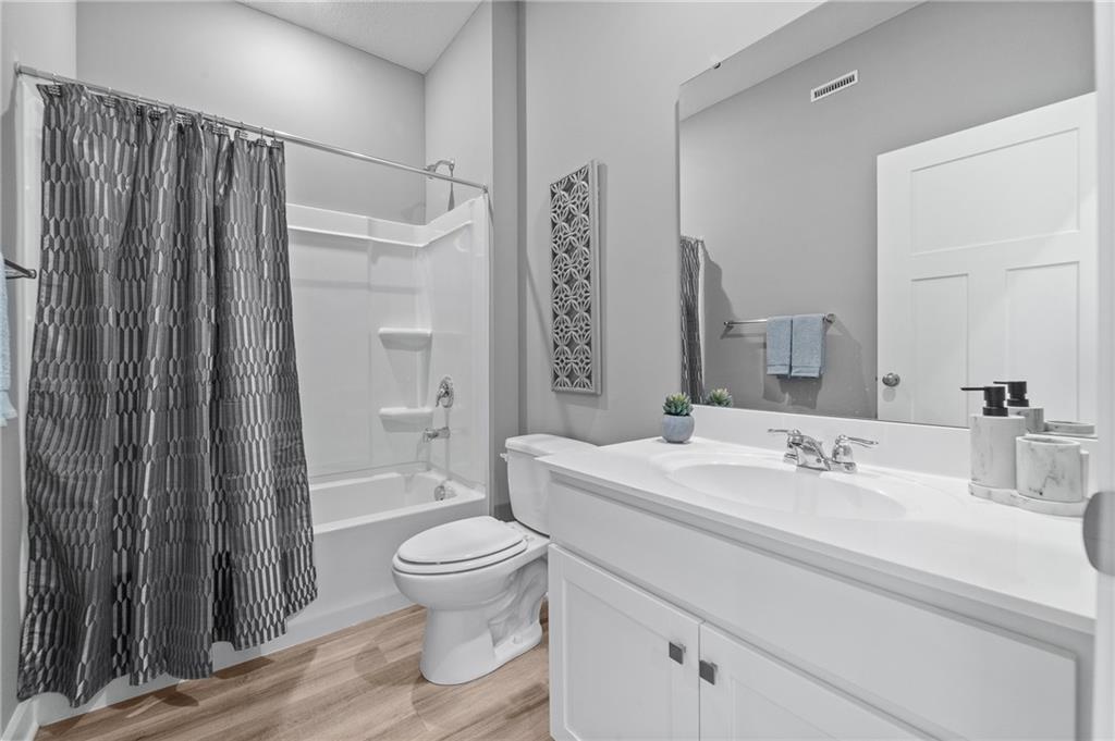 121 Jerome Drive Butler, PA 16001 - Photo 17 of 20 a bathroom with a sink a toilet and shower