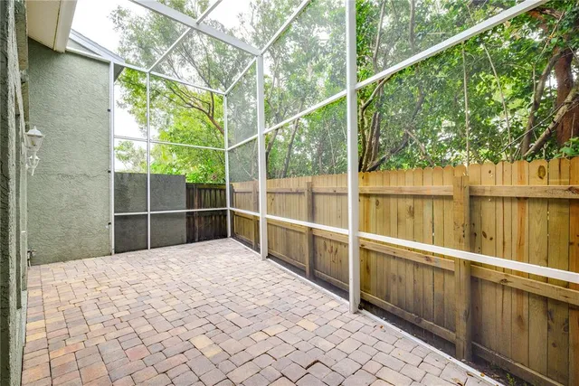 a view of a backyard of the house