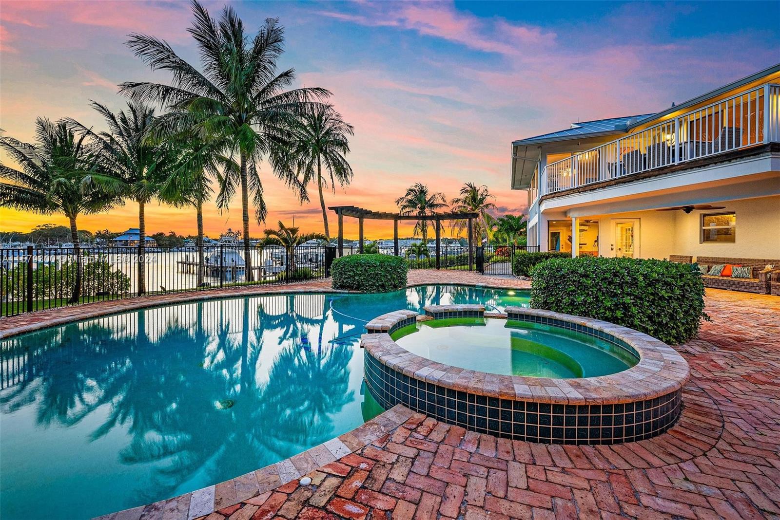 4643 Cheerio Way Stuart, FL 34997 - Photo 12 of 69 a view of swimming pool with outdoor seating and plants