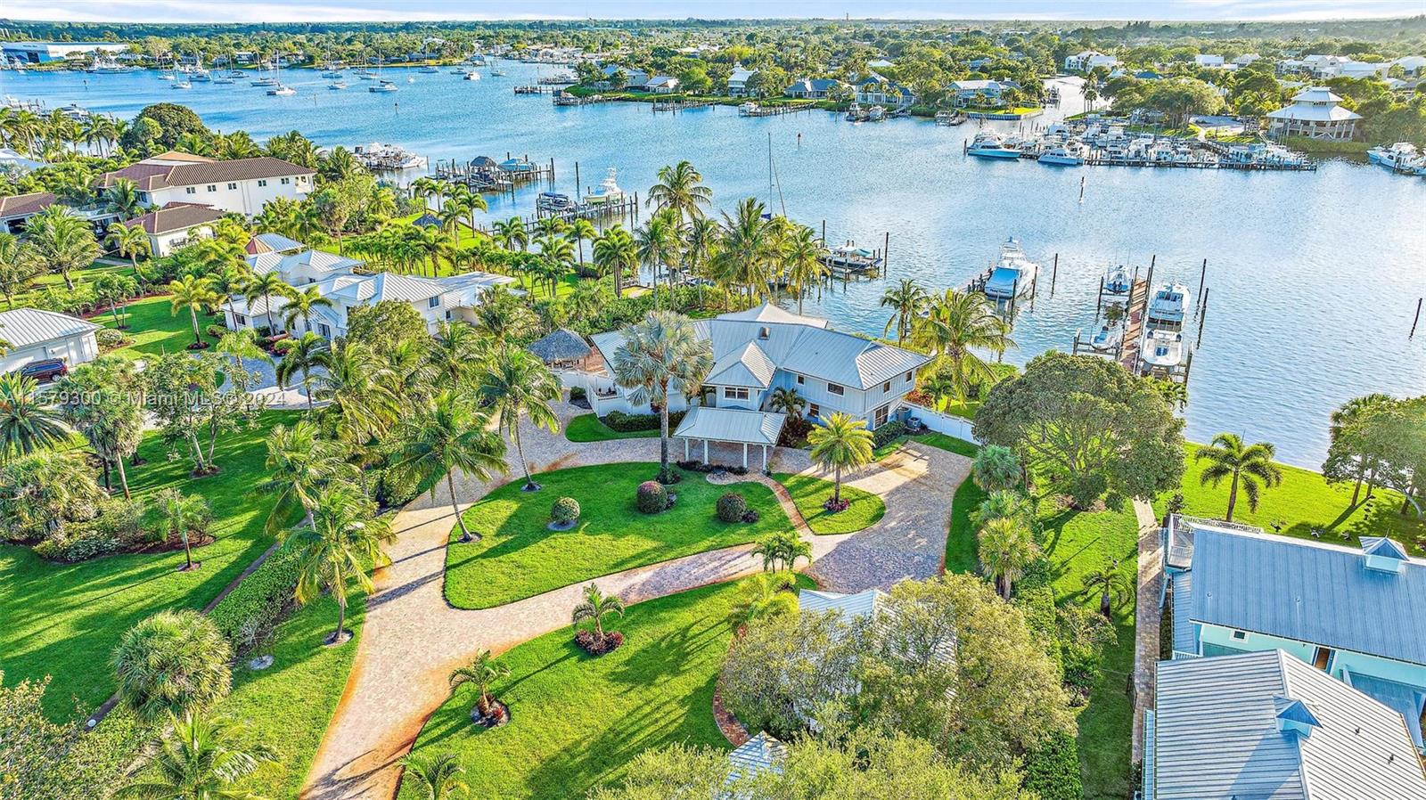 4643 Cheerio Way Stuart, FL 34997 - Photo 21 of 69 an aerial view of a houses with a lake view