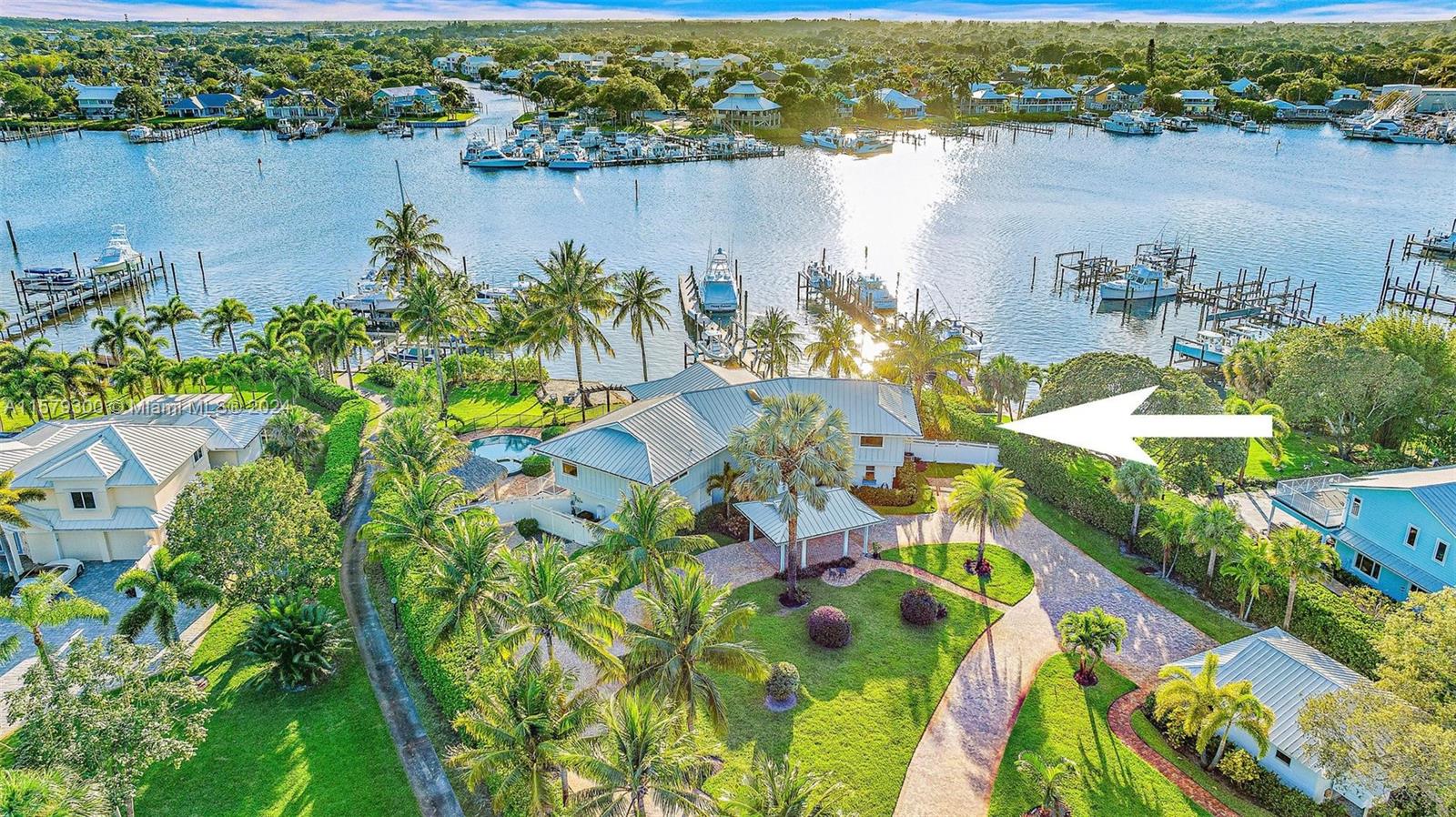 4643 Cheerio Way Stuart, FL 34997 - Photo 22 of 69 an aerial view of a house with a lake view