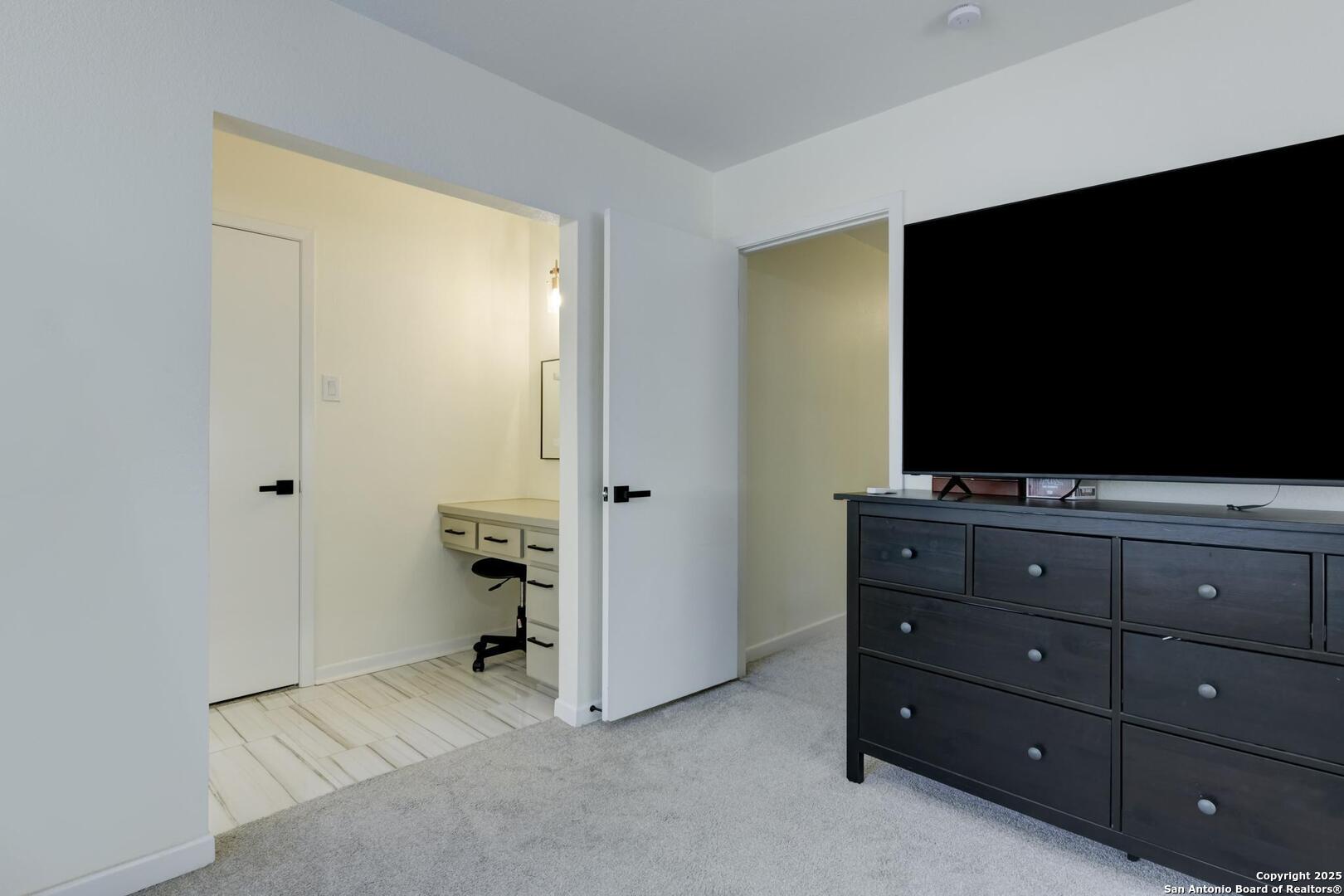5018 Risada Street San Antonio, TX 78233 - Photo 26 of 39 a living room with furniture and a flat screen tv