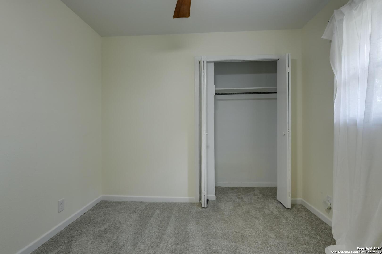 5018 Risada Street San Antonio, TX 78233 - Photo 33 of 39 an empty room that has a grey walls