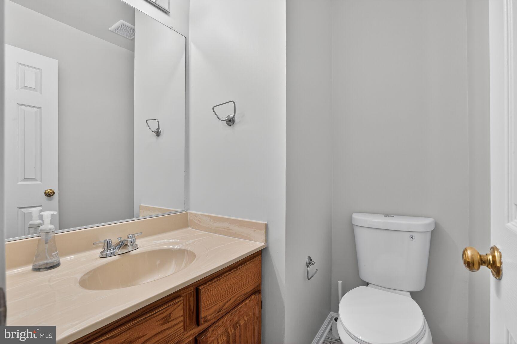 8408 Millwood Drive Springfield, VA 22152 - Photo 7 of 28 main level half bath