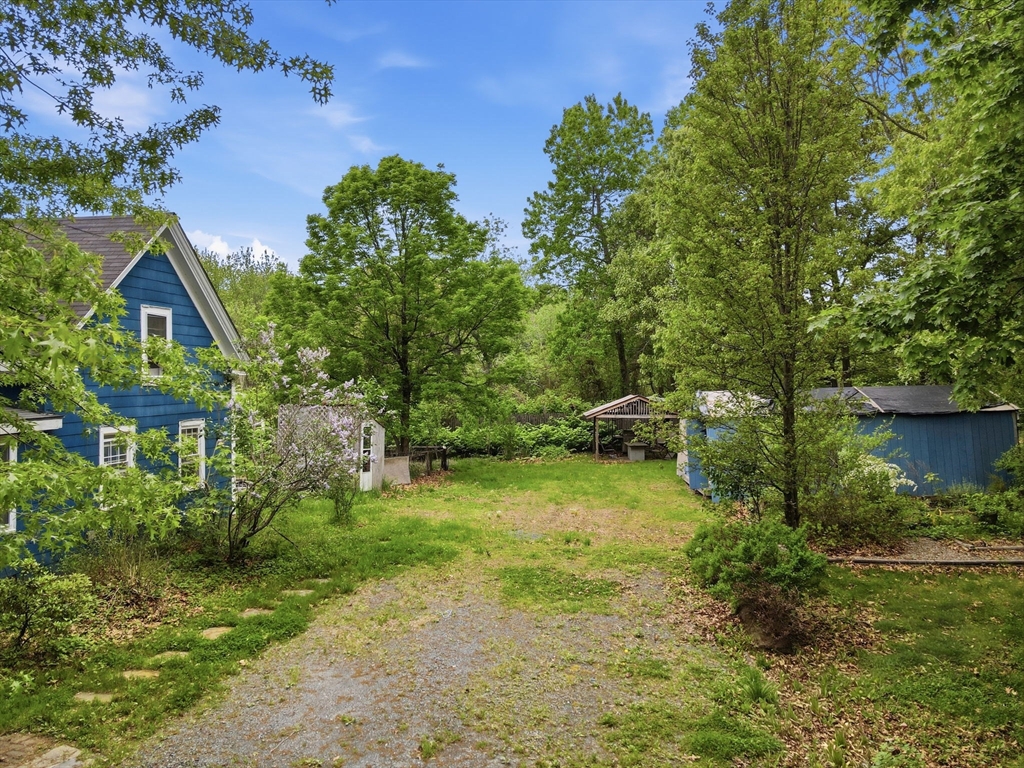 200 Stockbridge Road Scituate, MA 02066 - Photo 7 of 14 a view of backyard with green space