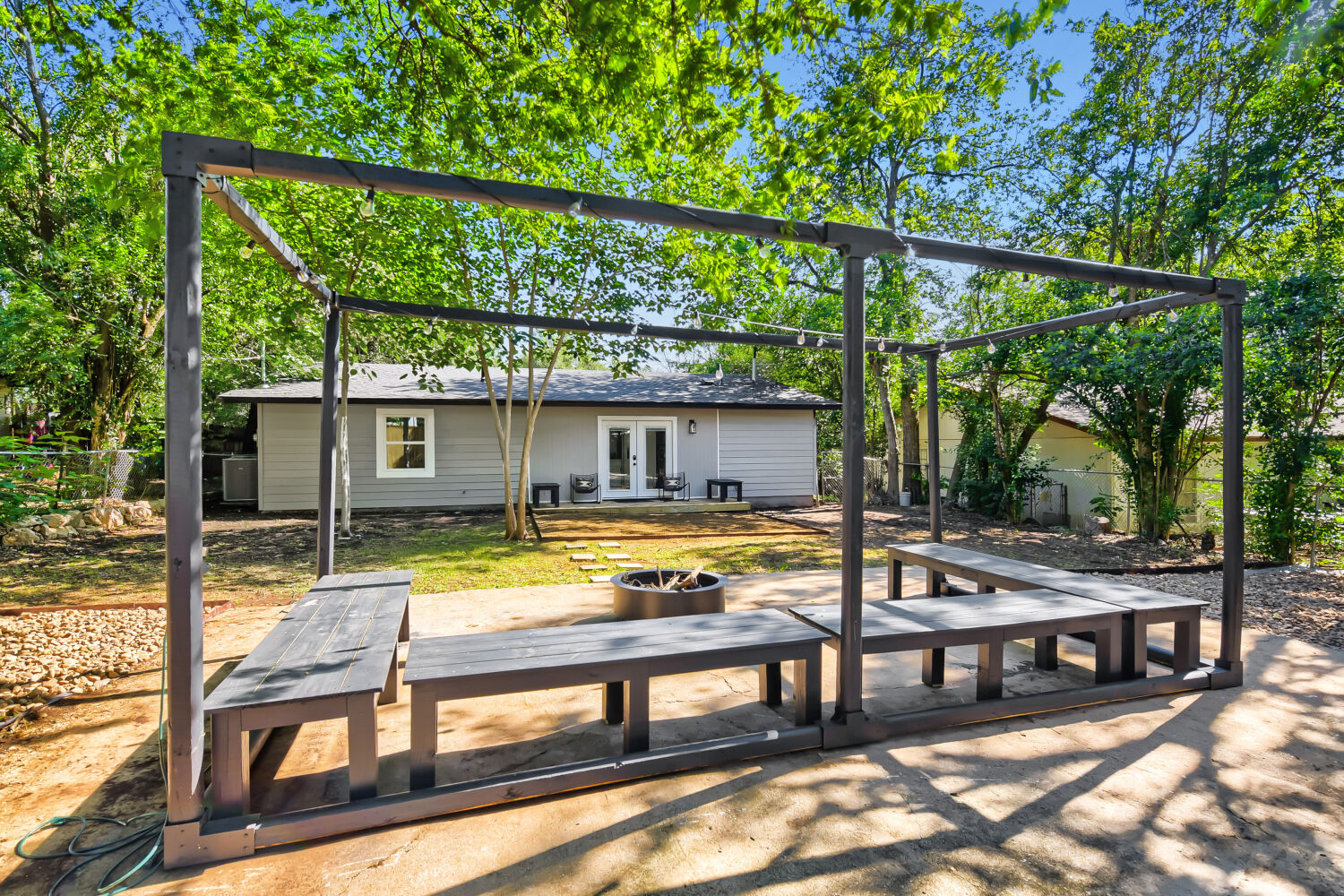 304 Sheraton Avenue Austin, TX 78745 - Photo 24 of 32 large slab with pergola and fire pit