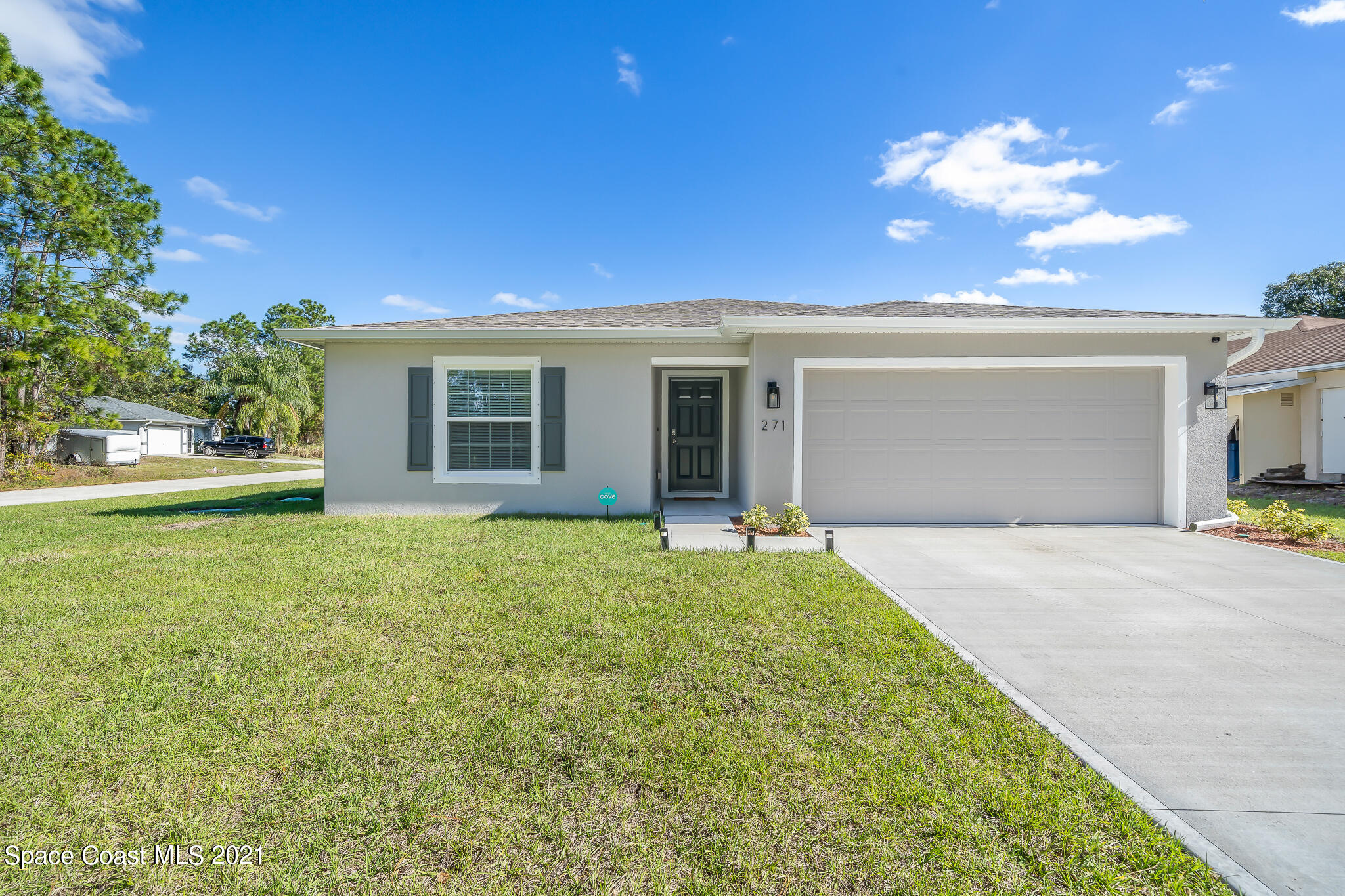 271 Wendover Road Southwest Palm Bay, FL 32908 - Photo 3 of 35 a view of a house with backyard and garden