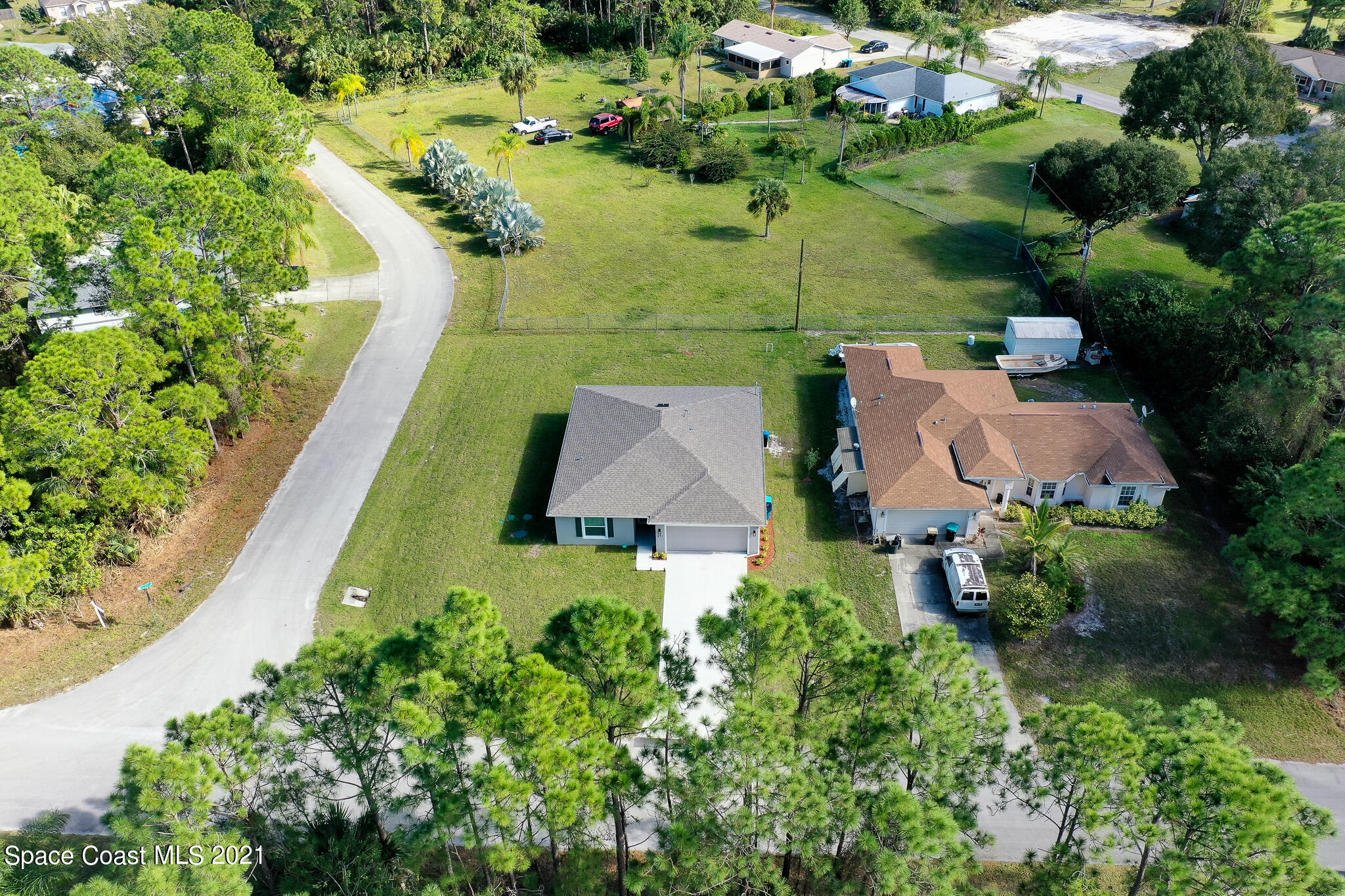 271 Wendover Road Southwest Palm Bay, FL 32908 - Photo 28 of 35 an aerial view of a house with a garden