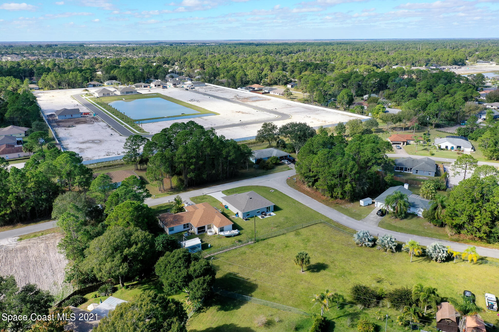 271 Wendover Road Southwest Palm Bay, FL 32908 - Photo 30 of 35 an aerial view of residential houses with outdoor space