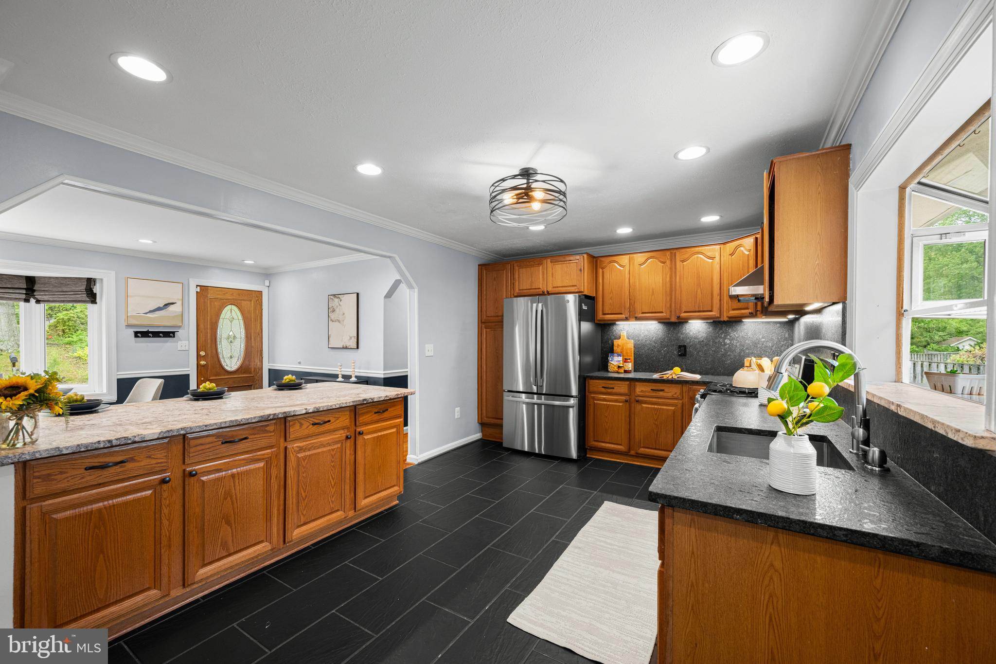 1410 Valley Creek Road Severn, MD 21144 - Photo 12 of 47 a kitchen with a sink stove and cabinets