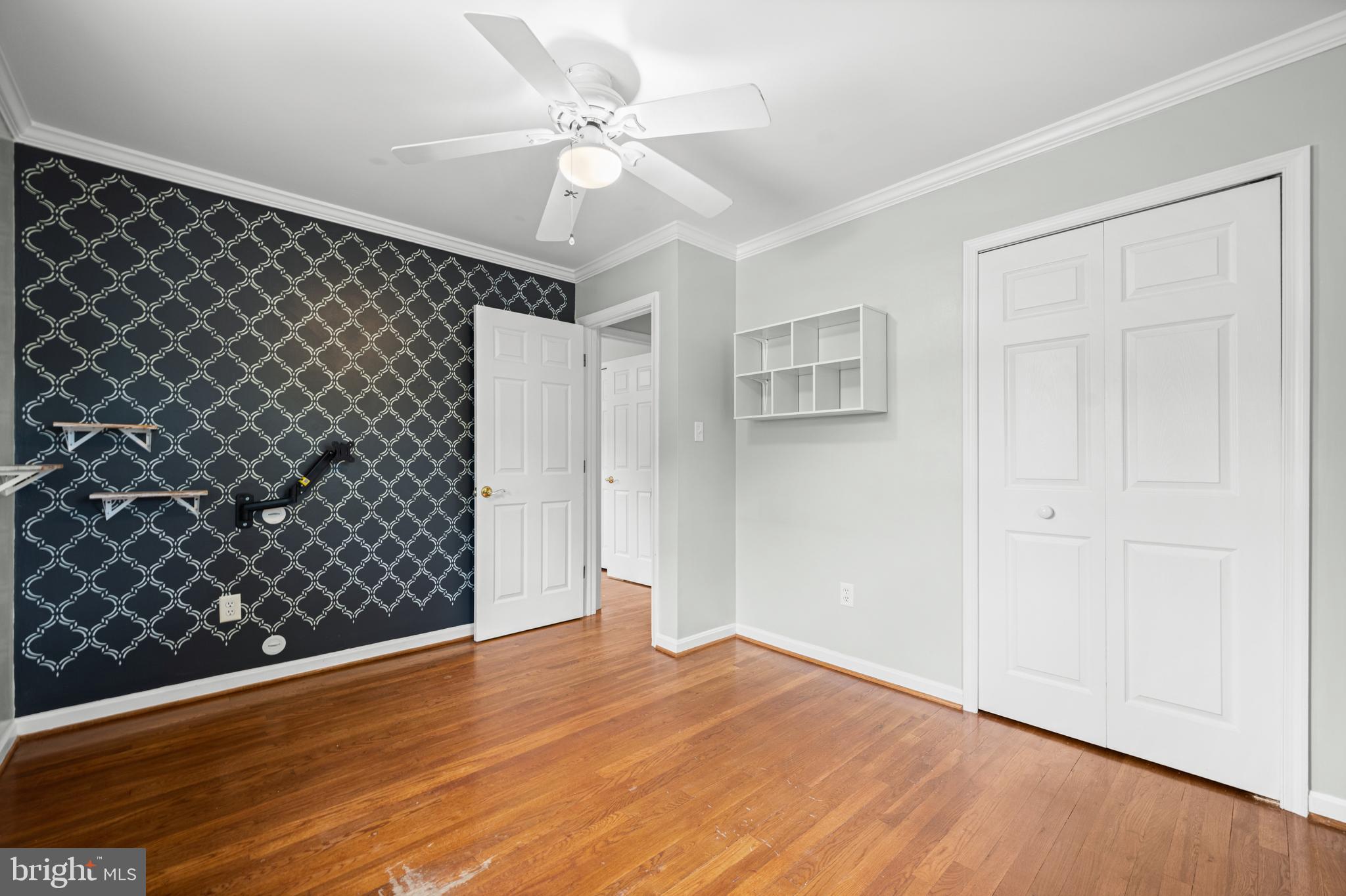 1410 Valley Creek Road Severn, MD 21144 - Photo 27 of 47 a view of a room with wooden floor
