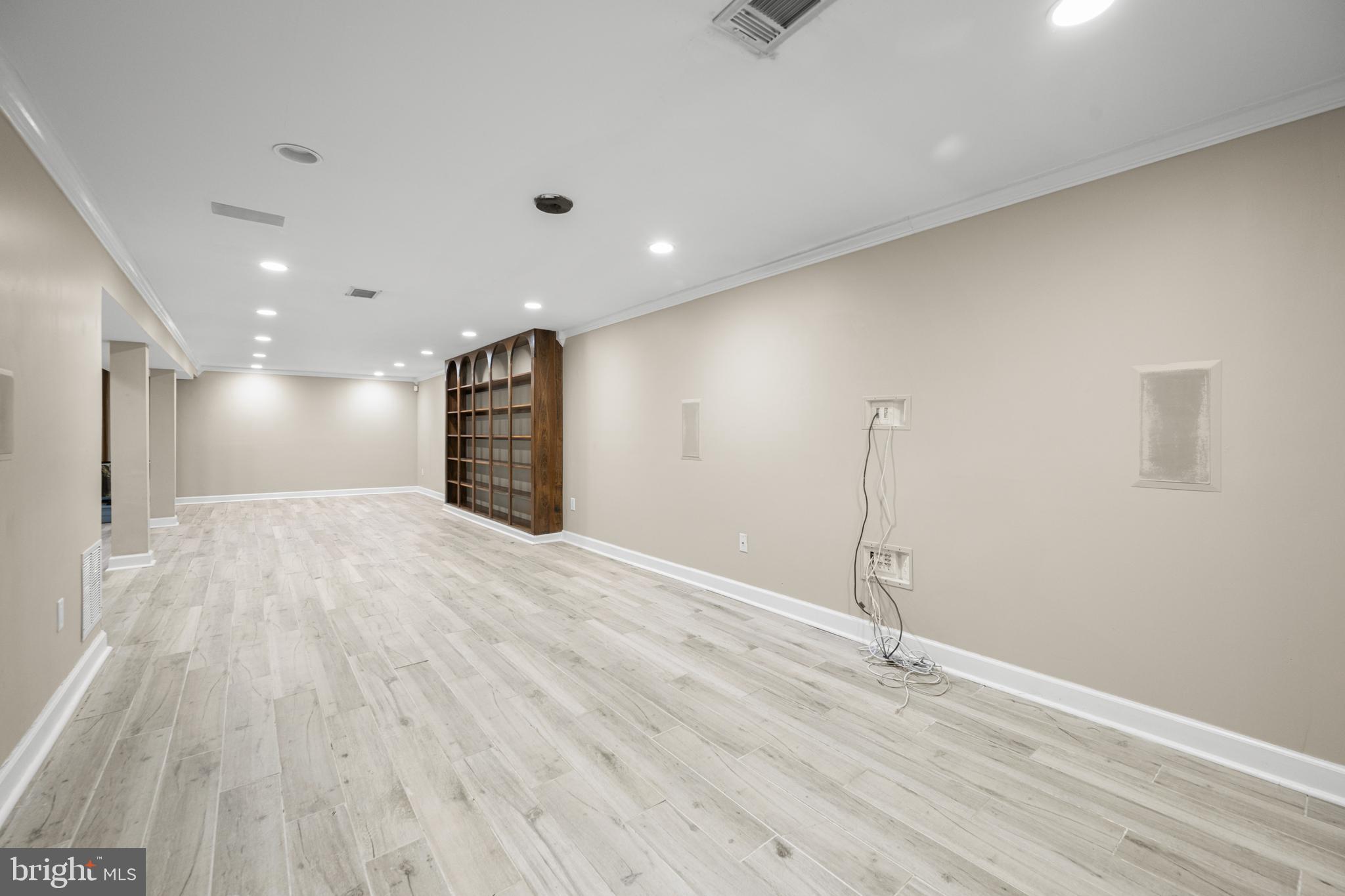 1410 Valley Creek Road Severn, MD 21144 - Photo 33 of 47 a view of empty room with wooden floor