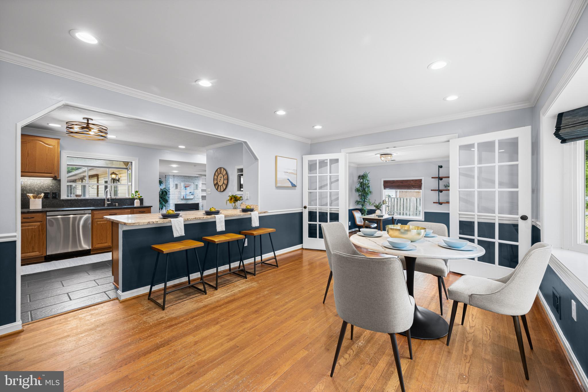 1410 Valley Creek Road Severn, MD 21144 - Photo 5 of 47 a view of a dining room kitchen with furniture and wooden floor