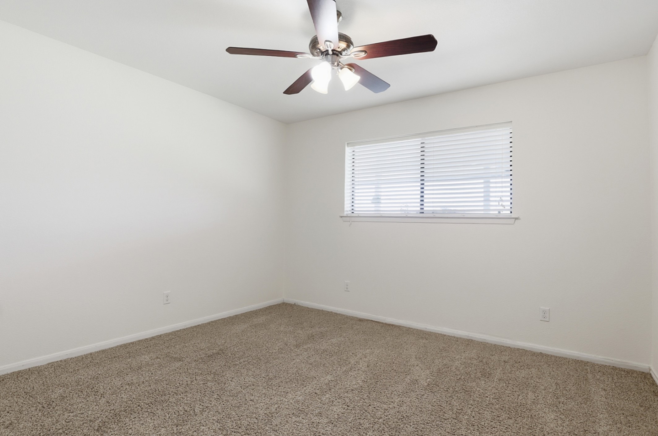 128 Skyview Terrace Leander, TX 78641 - Photo 16 of 23 Bedroom featuring carpet floors and a ceiling fan