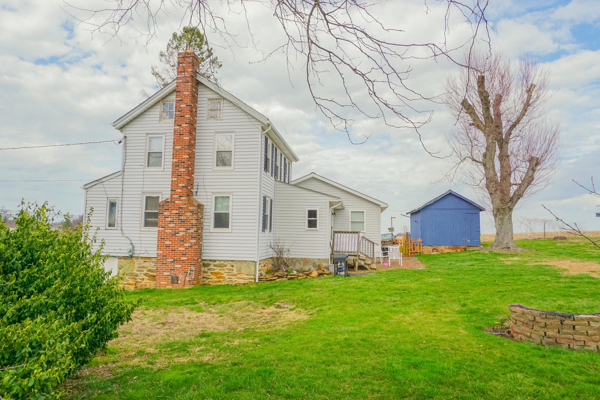 14803 Mt Olivet Road Stewartstown, PA 17363 - Photo 11 of 81 a view of a house with a yard