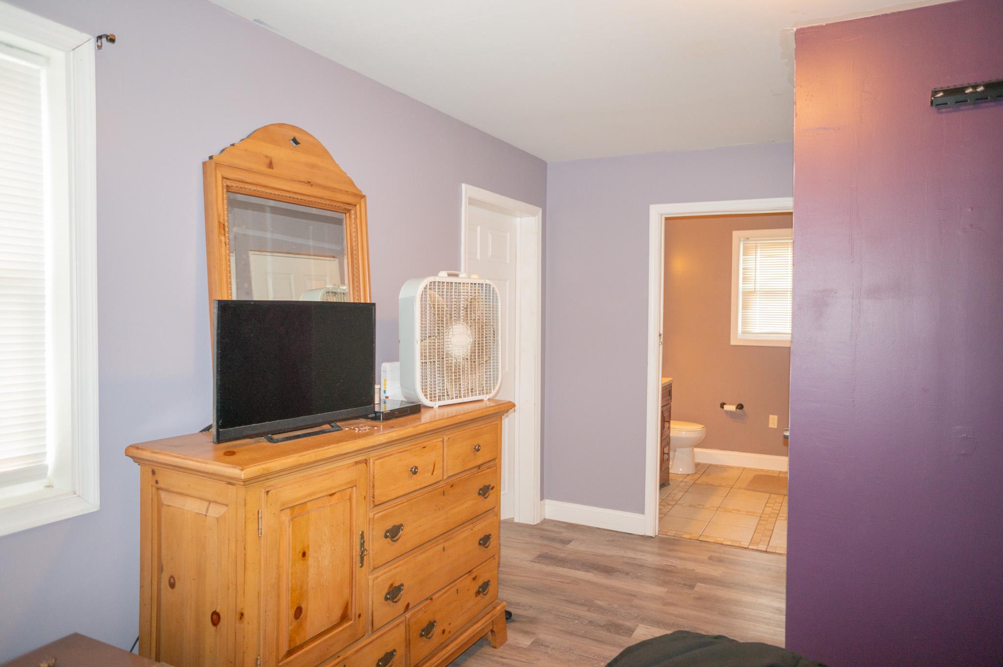 14803 Mt Olivet Road Stewartstown, PA 17363 - Photo 22 of 81 a living room with furniture and flat screen tv
