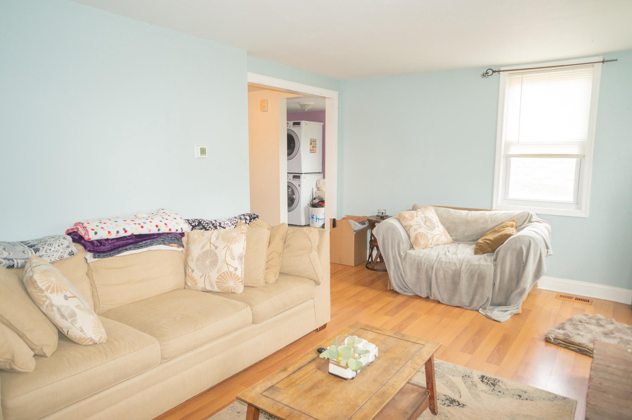 14803 Mt Olivet Road Stewartstown, PA 17363 - Photo 35 of 81 a living room with furniture and a couch