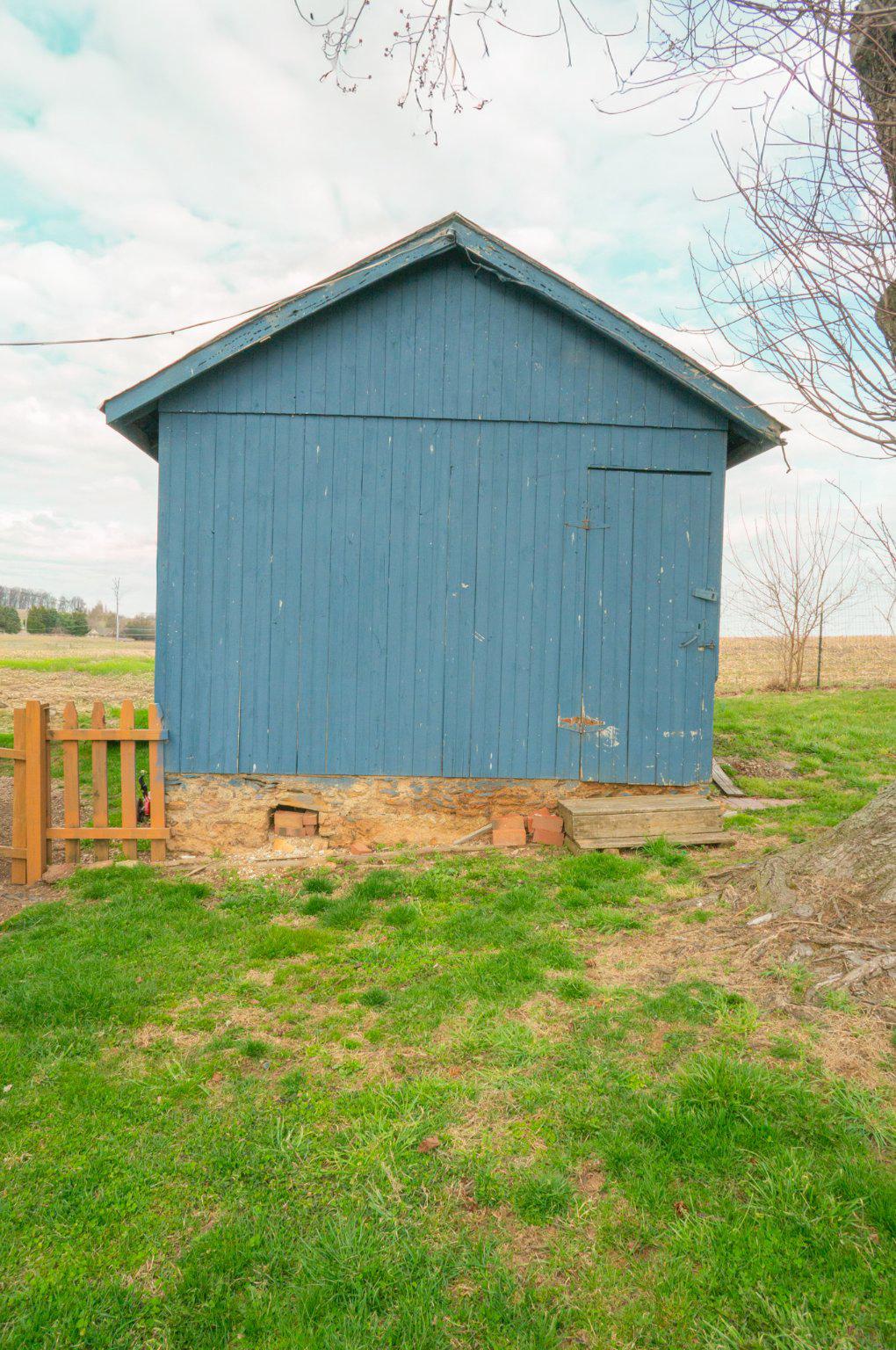 14803 Mt Olivet Road Stewartstown, PA 17363 - Photo 53 of 81 a couple of table and chairs sitting in yard with wooden fence