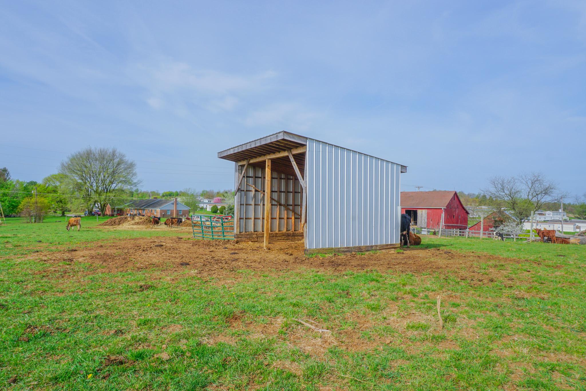 14803 Mt Olivet Road Stewartstown, PA 17363 - Photo 58 of 81 a front view of a house with garden