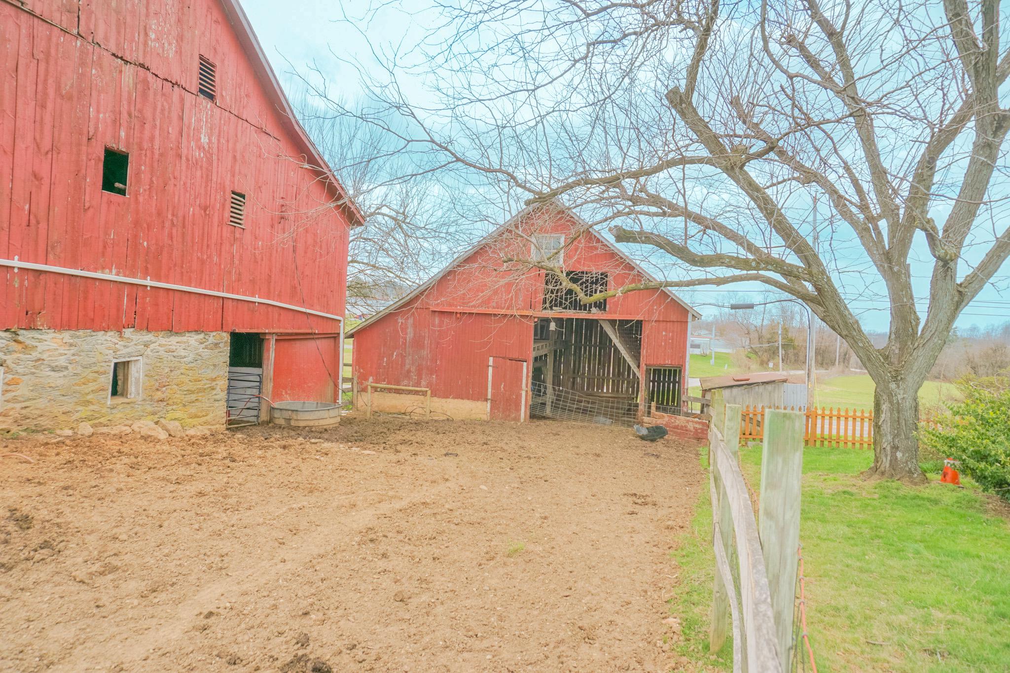 14803 Mt Olivet Road Stewartstown, PA 17363 - Photo 71 of 81 Charming red barns in serene countryside.