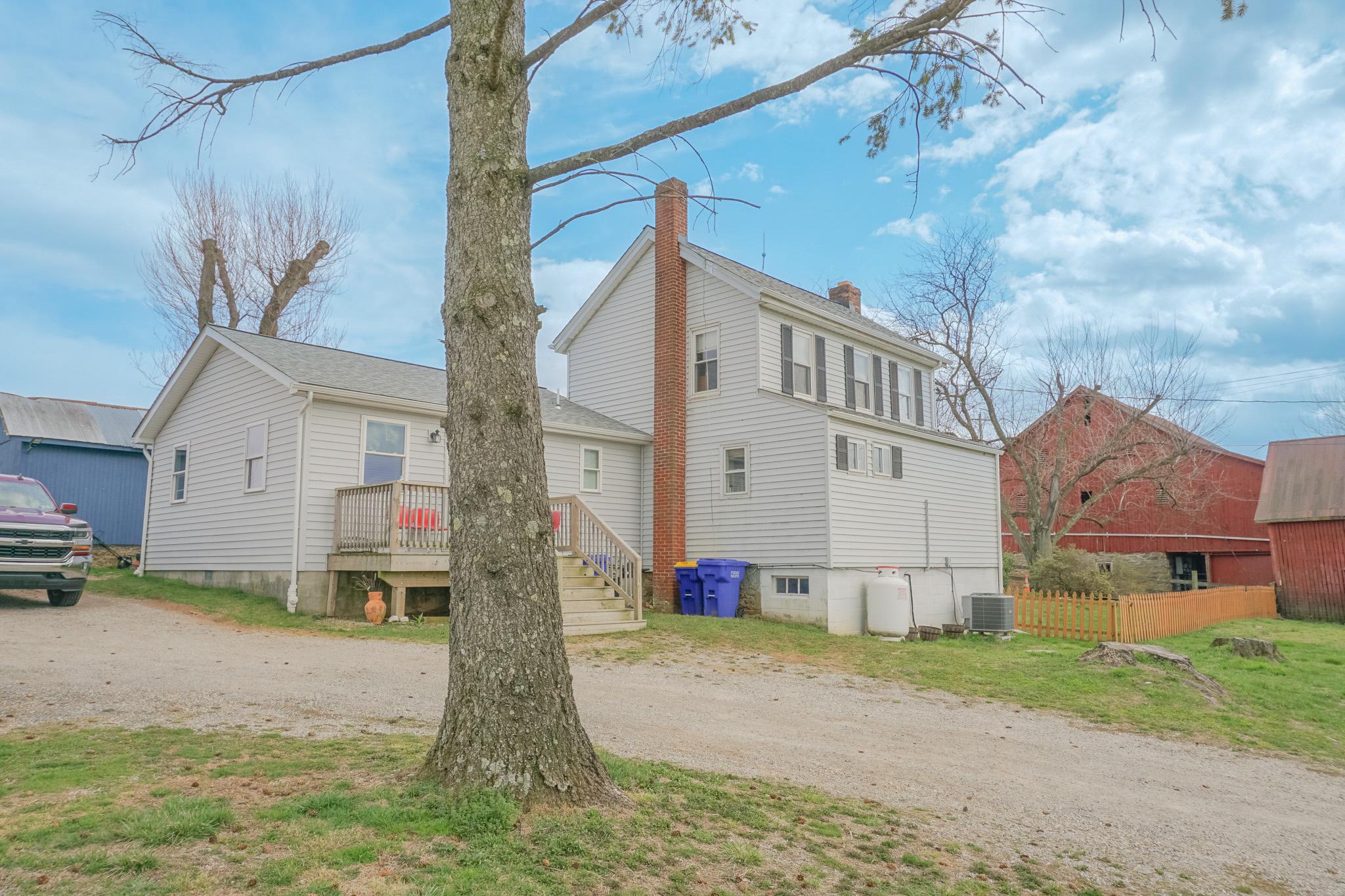 14803 Mt Olivet Road Stewartstown, PA 17363 - Photo 76 of 81 a view of a house with a yard