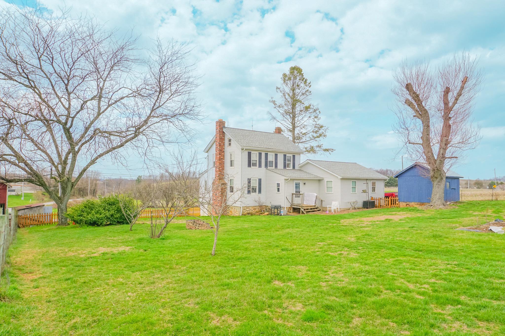14803 Mt Olivet Road Stewartstown, PA 17363 - Photo 79 of 81 a view of a house with a yard