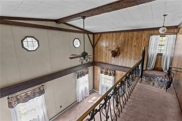 a view of an entryway with a front door