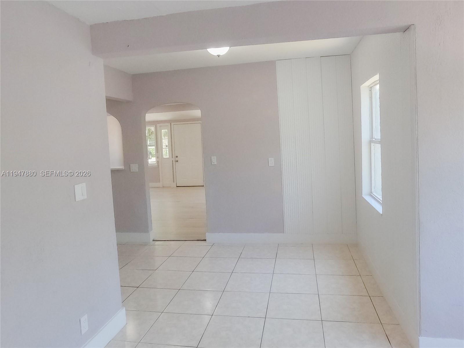 1051 Northwest 63rd Street Miami, FL 33150 - Photo 19 of 30 wooden floor in an empty room