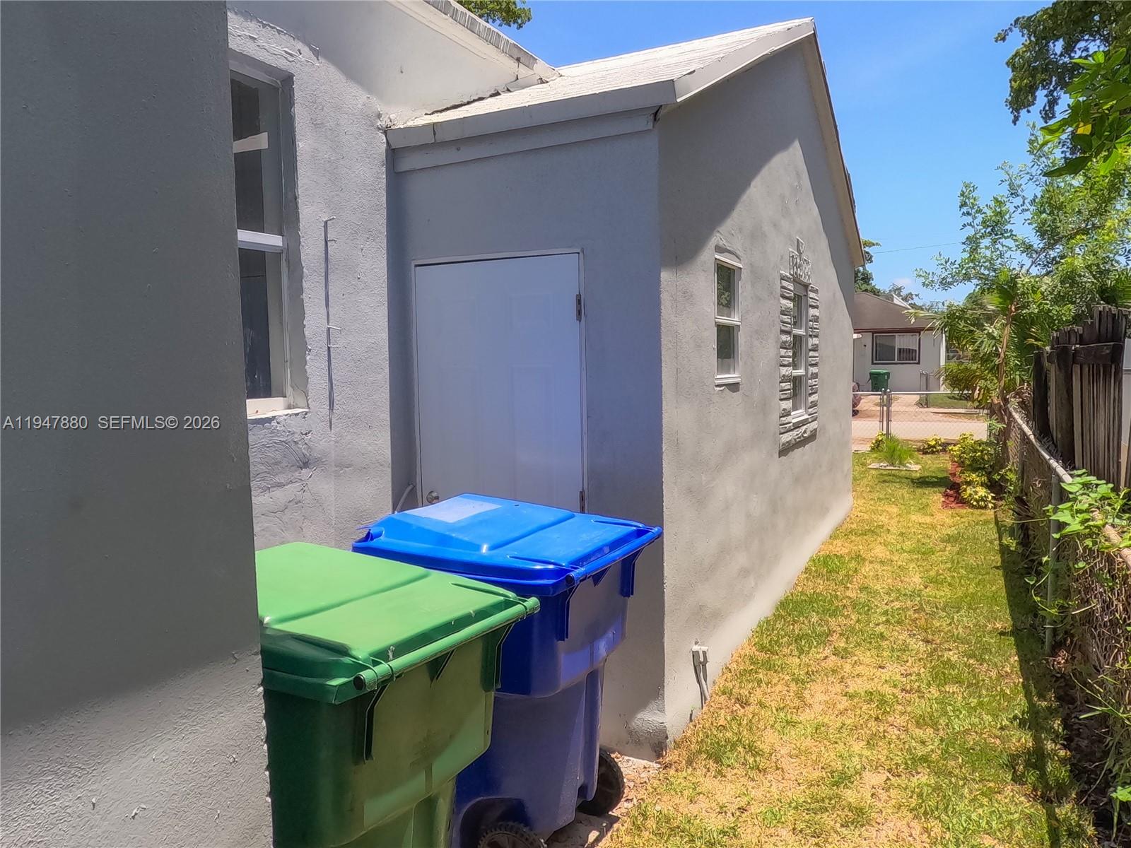 1051 Northwest 63rd Street Miami, FL 33150 - Photo 28 of 30 a view of a backyard with furniture
