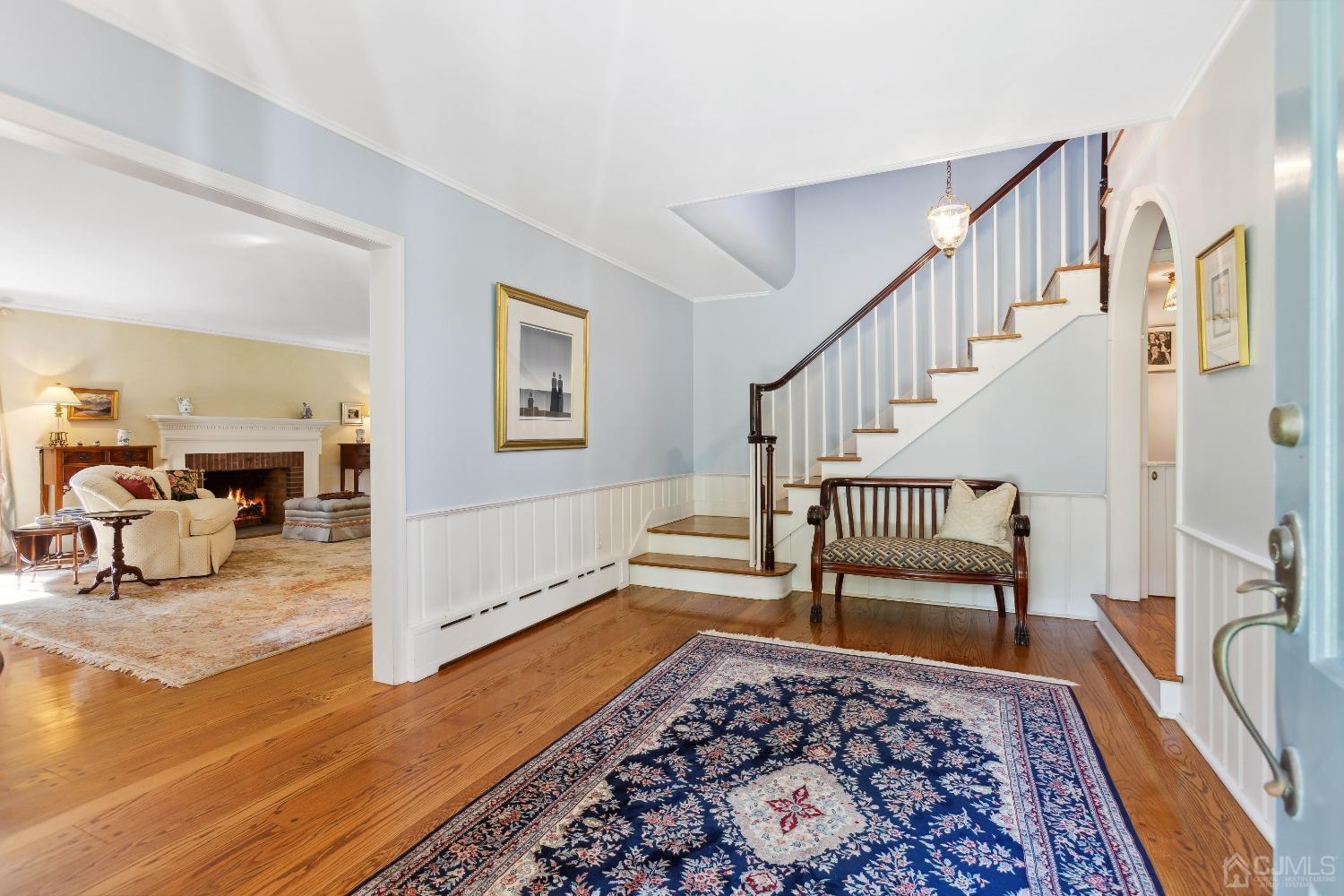 32 Oak Hills Road Edison, NJ 08820 - Photo 11 of 54 a room with lots of white furniture and a rug