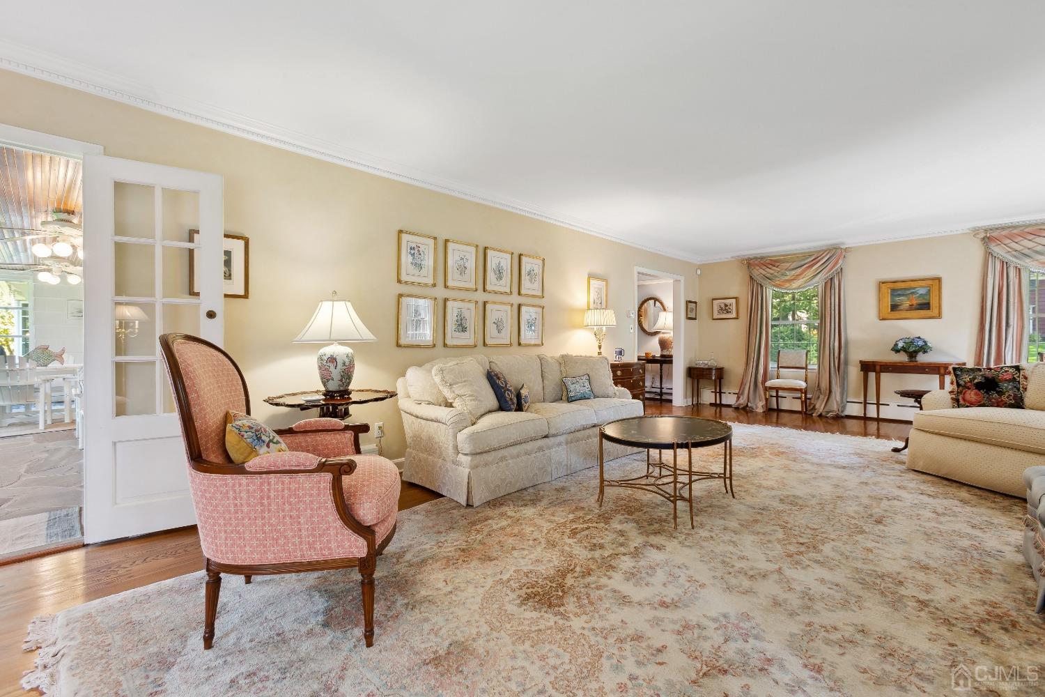 32 Oak Hills Road Edison, NJ 08820 - Photo 14 of 54 a living room with furniture and a large window