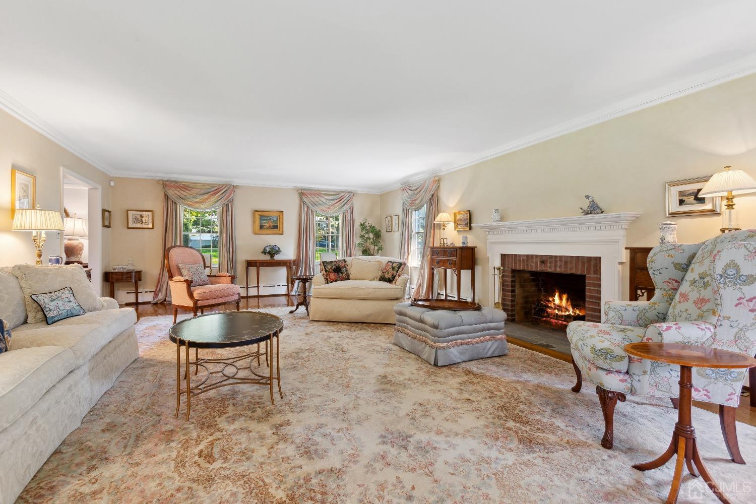 32 Oak Hills Road Edison, NJ 08820 - Photo 15 of 54 a living room with furniture and a fireplace