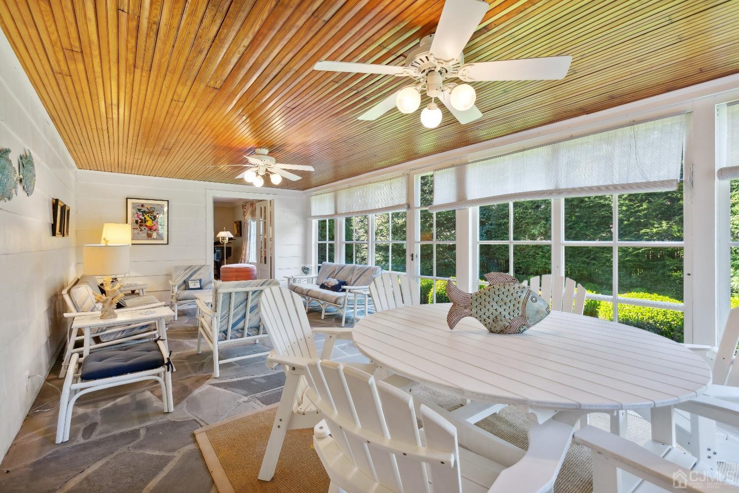 32 Oak Hills Road Edison, NJ 08820 - Photo 17 of 54 a view of a dining room with furniture window and outside view