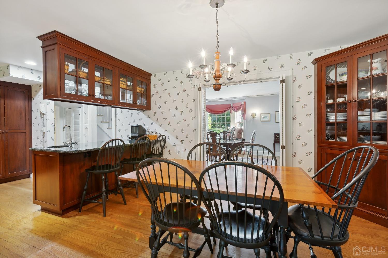 32 Oak Hills Road Edison, NJ 08820 - Photo 19 of 54 a view of a dining room with furniture window and wooden floor