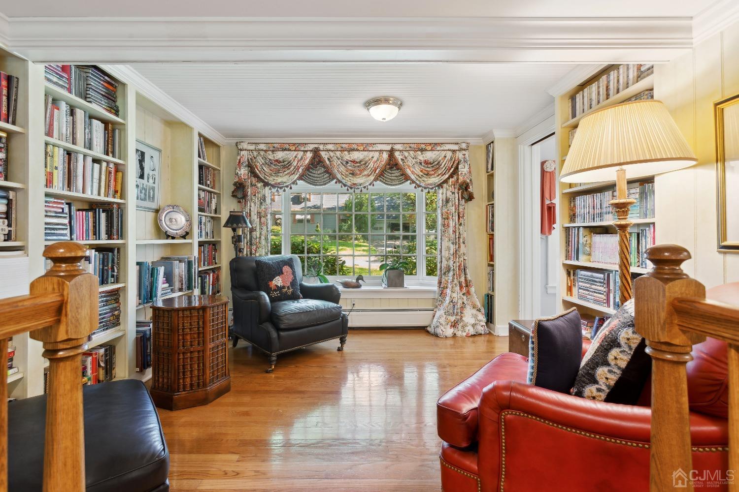 32 Oak Hills Road Edison, NJ 08820 - Photo 26 of 54 a living room with furniture and a floor to ceiling window