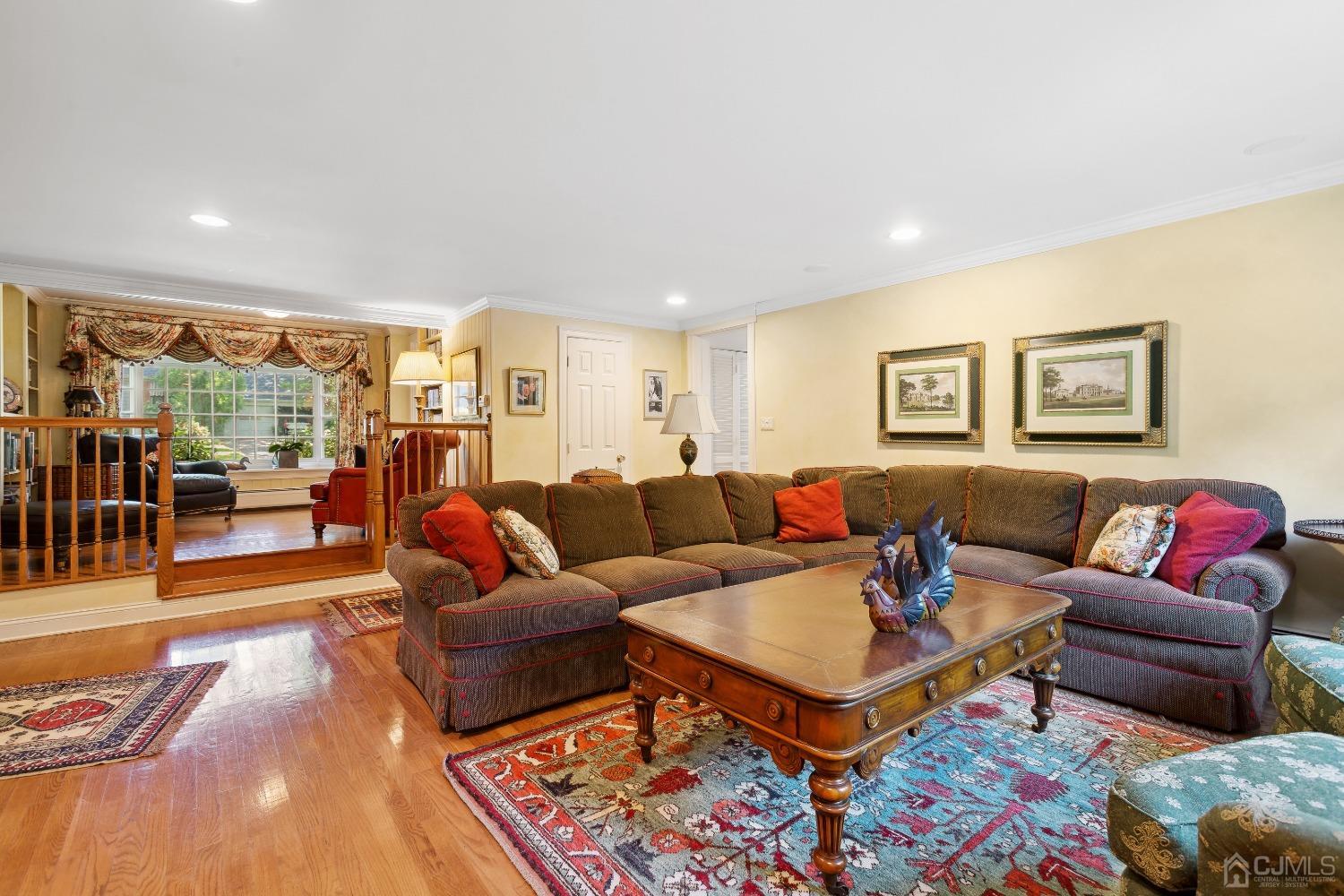 32 Oak Hills Road Edison, NJ 08820 - Photo 28 of 54 a living room with furniture and a rug