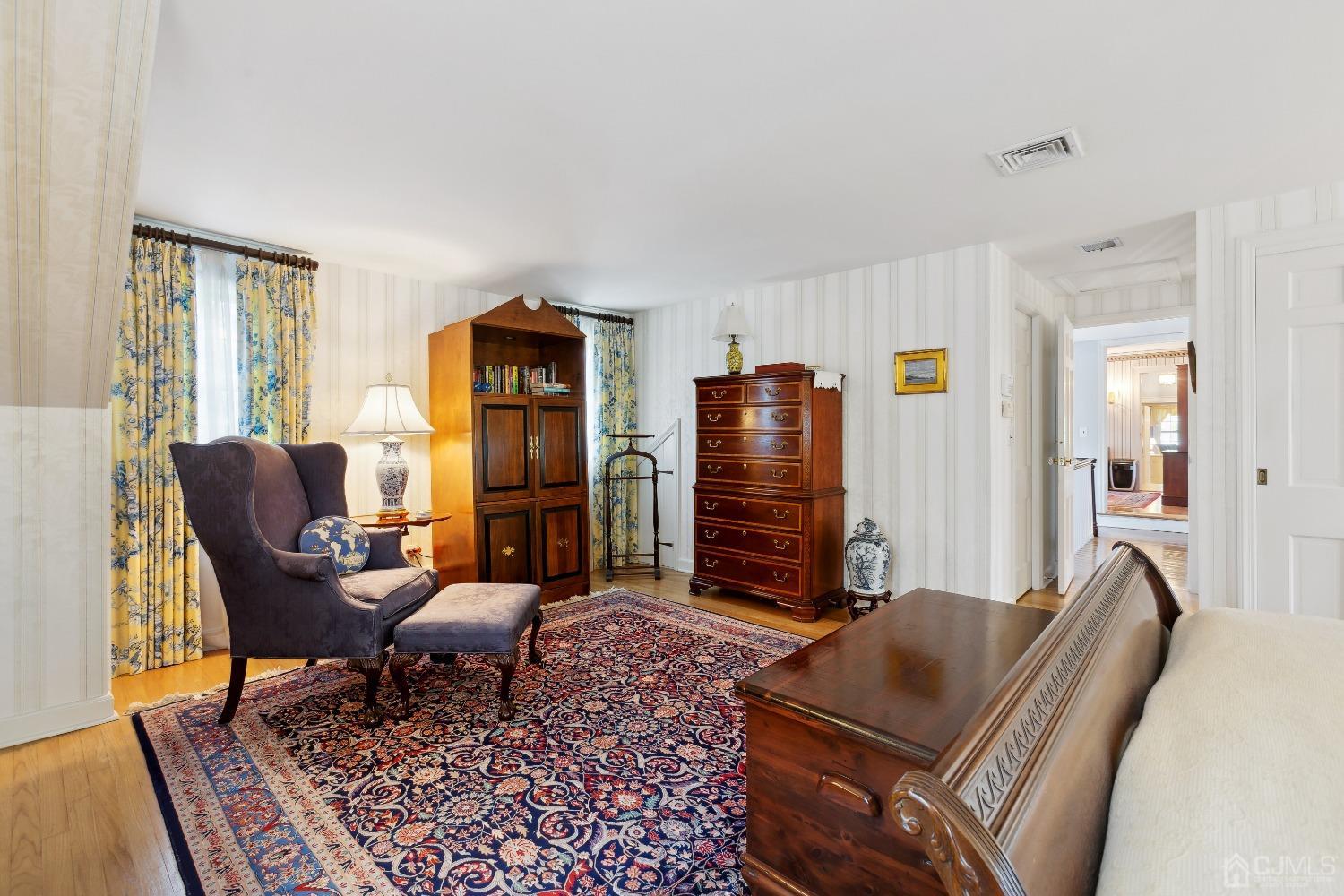 32 Oak Hills Road Edison, NJ 08820 - Photo 31 of 54 a living room with furniture rug and wooden floor