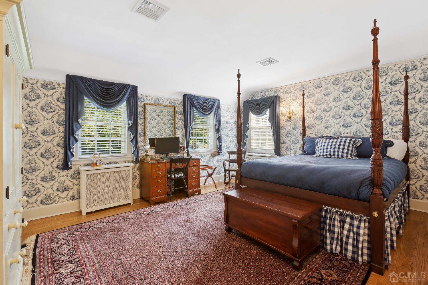 32 Oak Hills Road Edison, NJ 08820 - Photo 34 of 54 a bedroom with furniture and a window