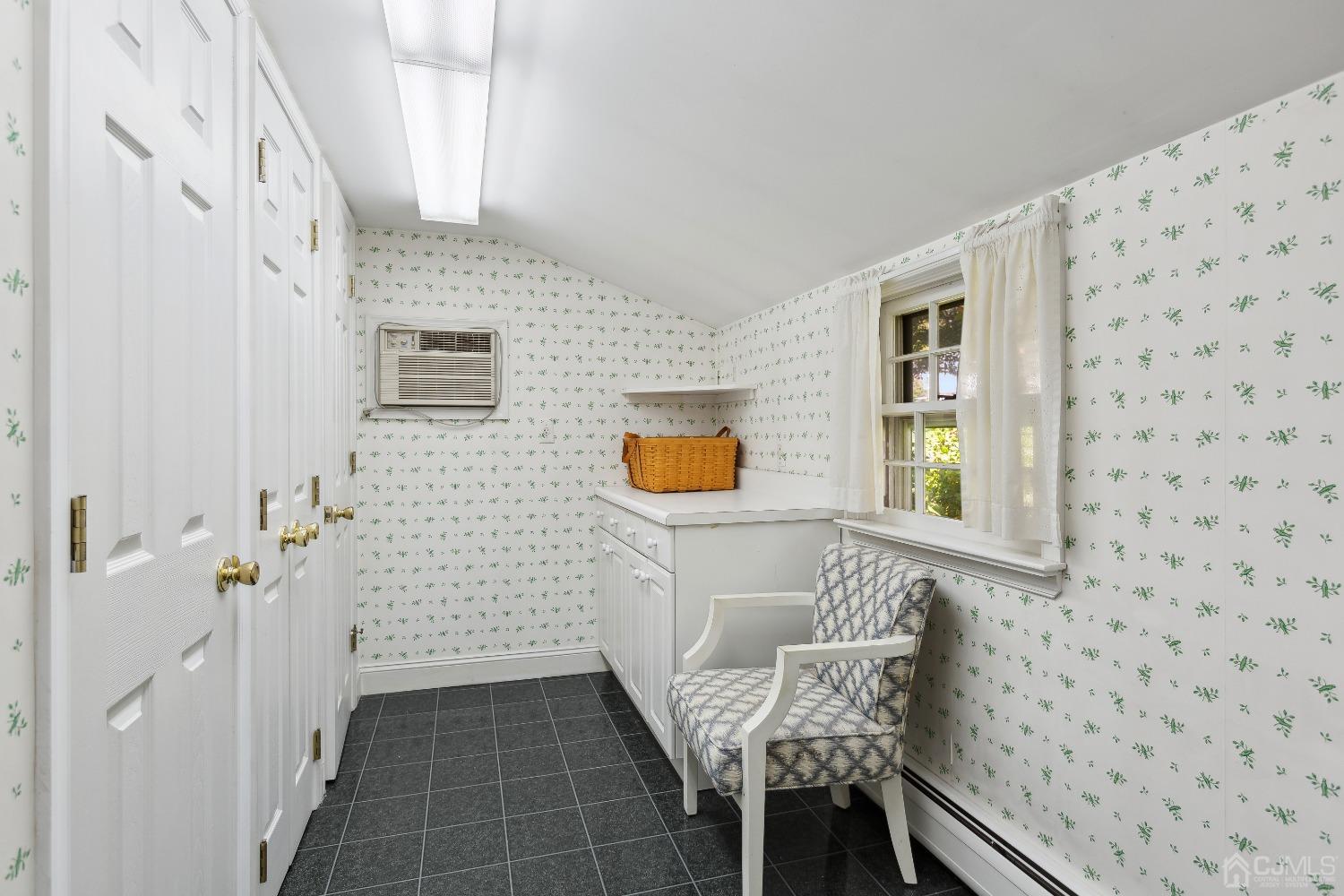 32 Oak Hills Road Edison, NJ 08820 - Photo 41 of 54 a bathroom with a sink and a mirror