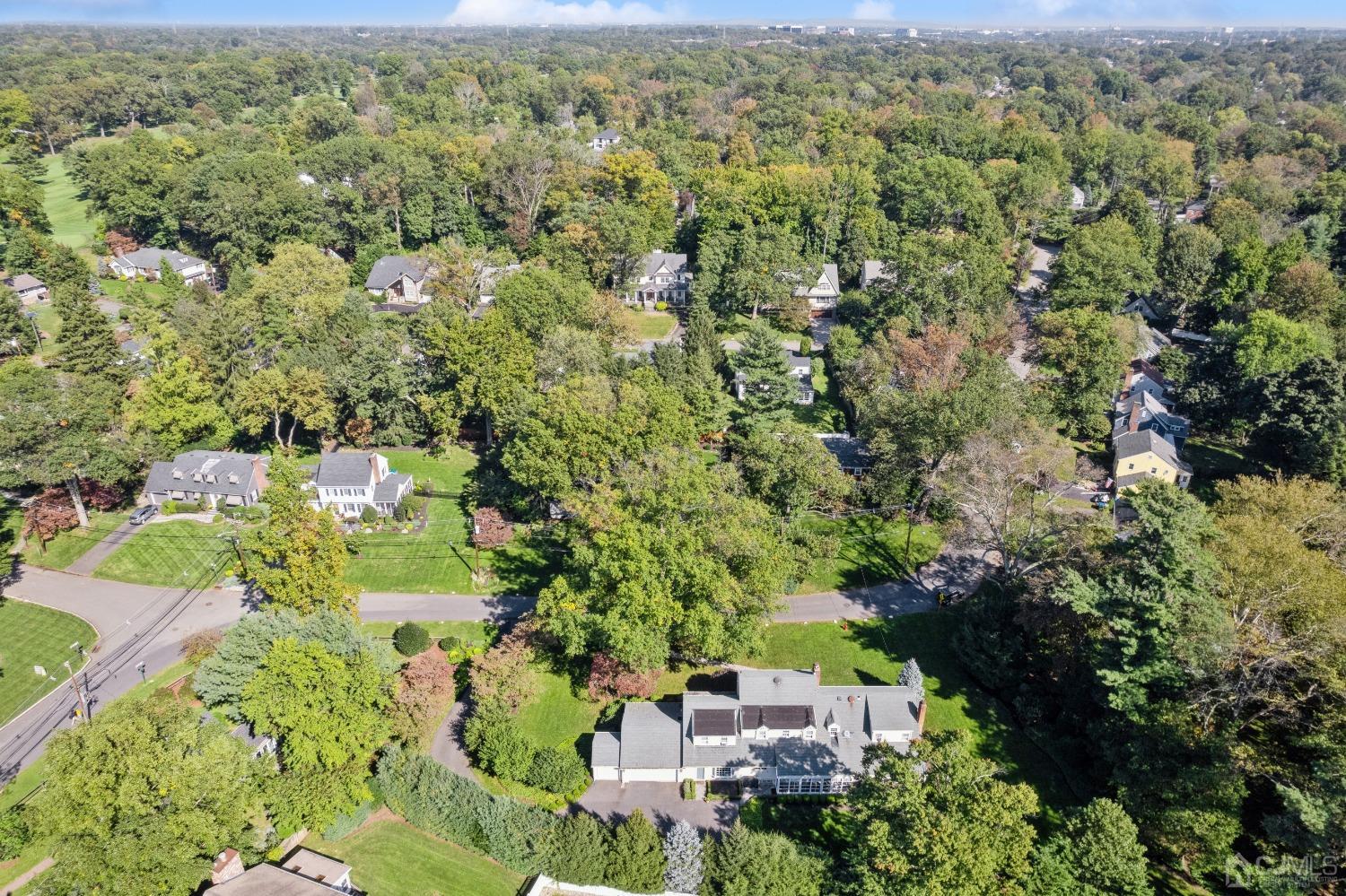 32 Oak Hills Road Edison, NJ 08820 - Photo 47 of 54 an aerial view of residential houses with outdoor space and trees