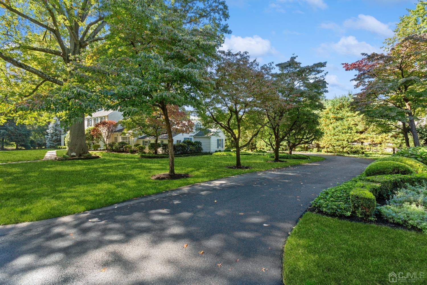 32 Oak Hills Road Edison, NJ 08820 - Photo 5 of 54 a view of a park with tree s