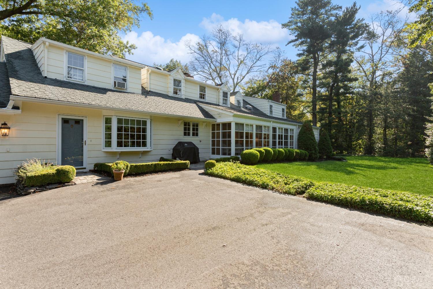 32 Oak Hills Road Edison, NJ 08820 - Photo 8 of 54 a view of a house with a patio