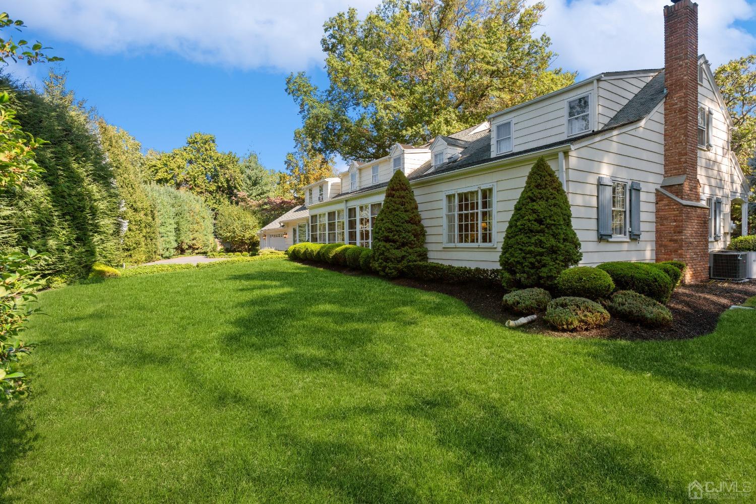 32 Oak Hills Road Edison, NJ 08820 - Photo 9 of 54 a view of a house with a backyard