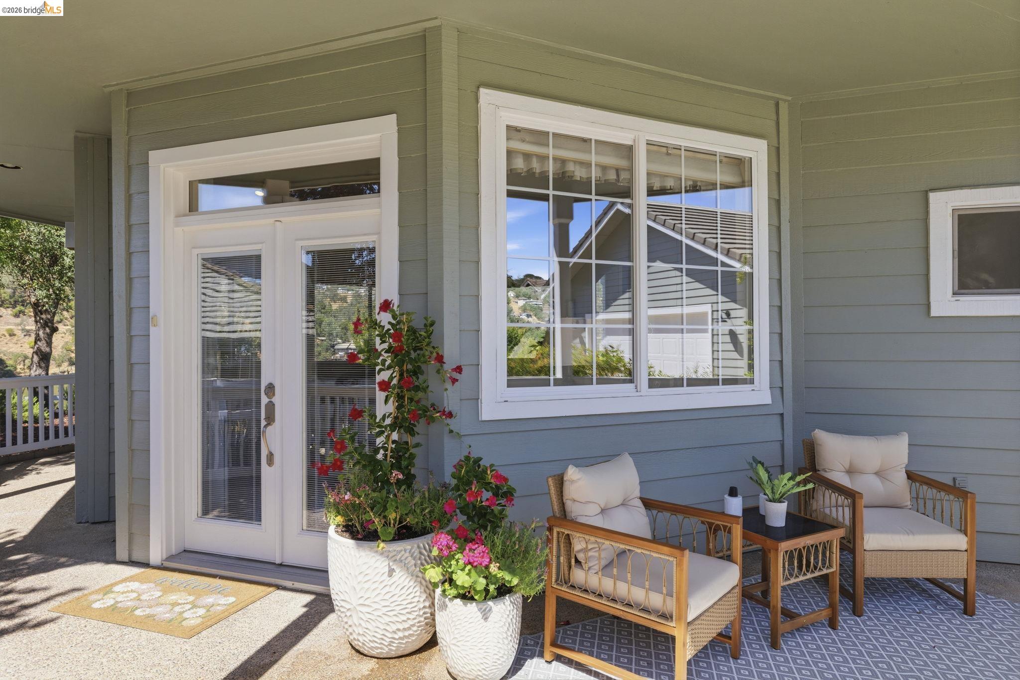 6242 Bluff View Road Copperopolis, CA 95228 - Photo 7 of 59 Covered porch with white railing and fresh paint